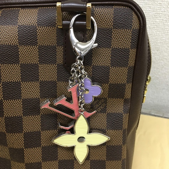 Authentic Louis Vuitton FLEUR D'EPI BAG
CHARM. - Picture 9 of 10